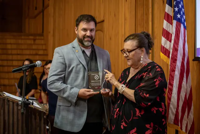 An honoree accepts an award