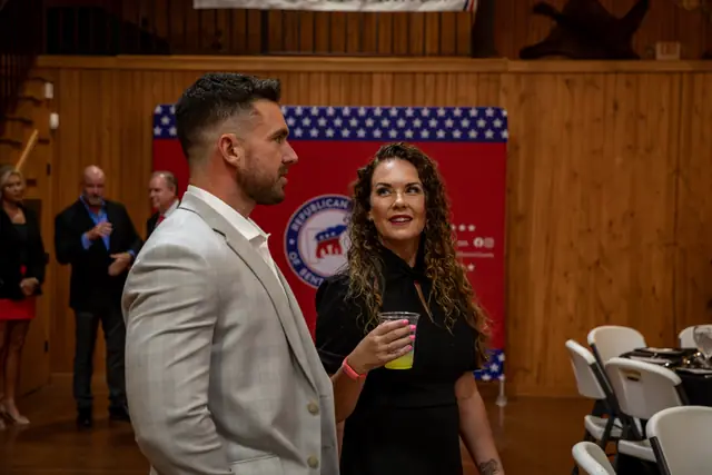 Guests at the Republican Party of Benton County backdrop