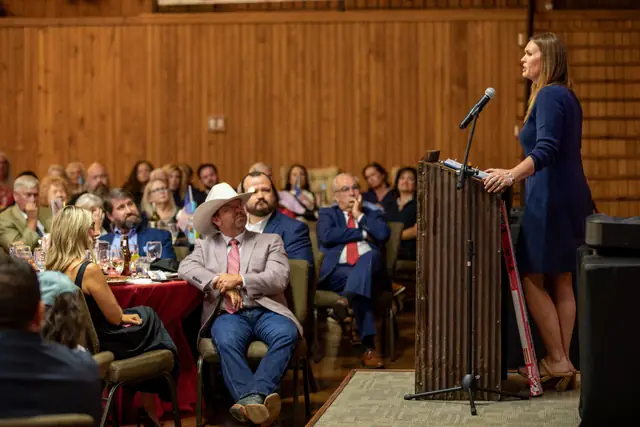 The room listens to the Governor