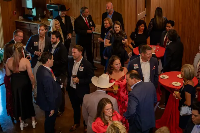 The reception fills ahead of dinner